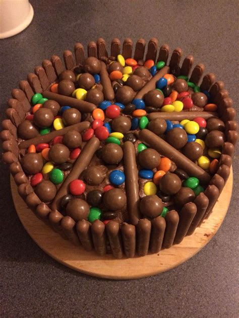 Add berries, chocolate or caramel sauce, and whipped cream in between i'm in love, and i haven't even tasted it yet! Chocolate finger cake! Topped with Maltesers and M&M's ...