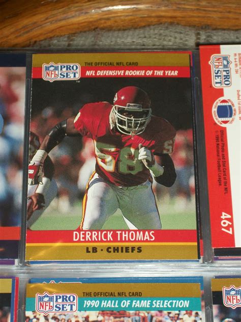 A small, rectangular piece of card or plastic, often with your signature, photograph, or other…. Derrick Thomas 1990 Pro Set "NFL Defensive Rookie of the Year" Football Card