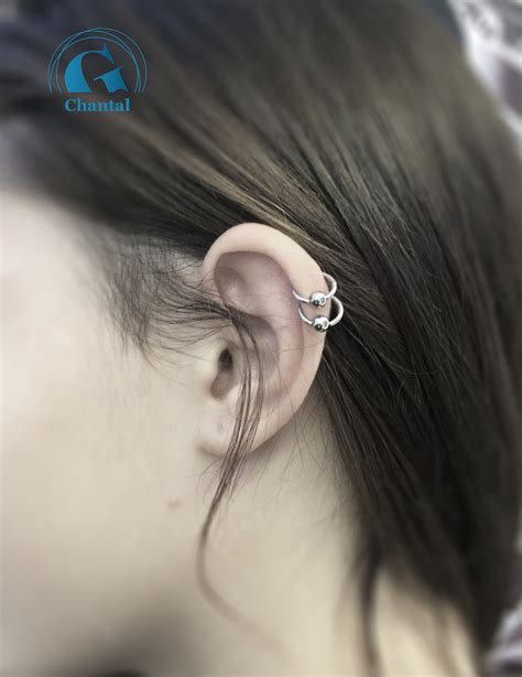 Latest ear piercings for women beautiful and cute ideas, piercings ear daith migraine relief, ear piercings helix double cartilage hoop, piercings ear. Piercing cartilage | Graphicaderme