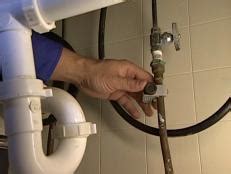Begin to scrape off the sticky greasy gunk. How to Remove an Old Dishwasher | how-tos | DIY