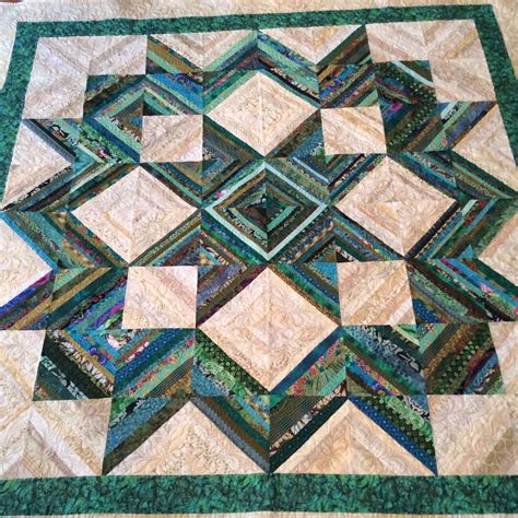 Great size for a crib quilt, or perfect for a toddler to each candle holder has its own pattern: Pin by Linda Duplantis on Quilting MY Projects | Log cabin ...