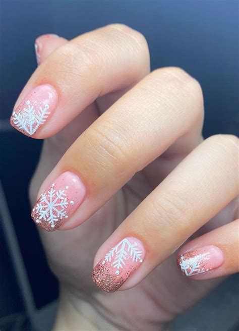 Winter nails 2020, gel painting nail art, cartoon characters nail art, penguin nail art knitted. Pretty Festive Nail Colours & Designs 2020 : Snowflake on nude pink Christmas nails