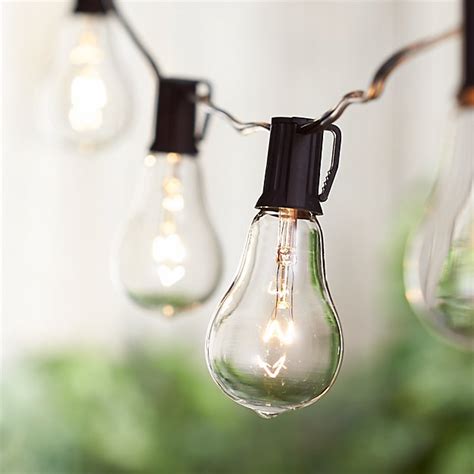 These string lights can be hanged the string configuration refers to the number of bulbs in an outdoor string light, the length of each string, the type of string, and the distance between each. Vintage Edison Bulb Outdoor String Lights | Crate and Barrel