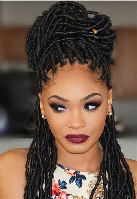 Loose side braid with waves and cobalt eyeliner, isn't it elegant enough? 66 of the Best Looking Black Braided Hairstyles for 2018