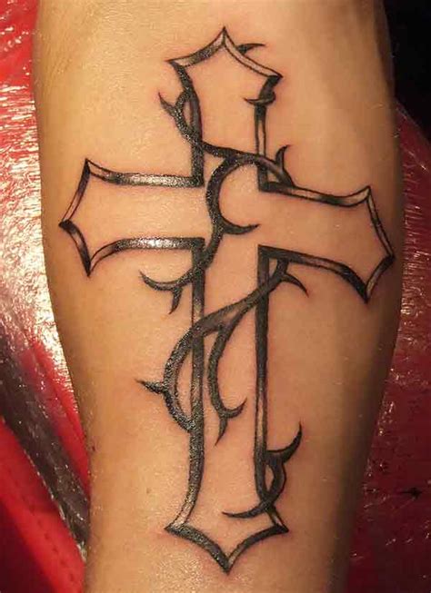 A tribal cross tattoo is the perfect mix of tradition and religion that consists of interlocking patterns and bold intricate designs made with rich black color. 15 Divinely Inked Cross Tattoo Design Ideas