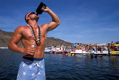 Downloading torrents is getting riskier every day. A young man drinks from a bottle of alcohol on a boat at ...