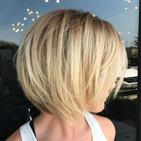 Layered hair layered hair is cut different lengths throughout, creating a layered effect. Blonde Layered Bob For Fine Hair | Hair styles, Short ...