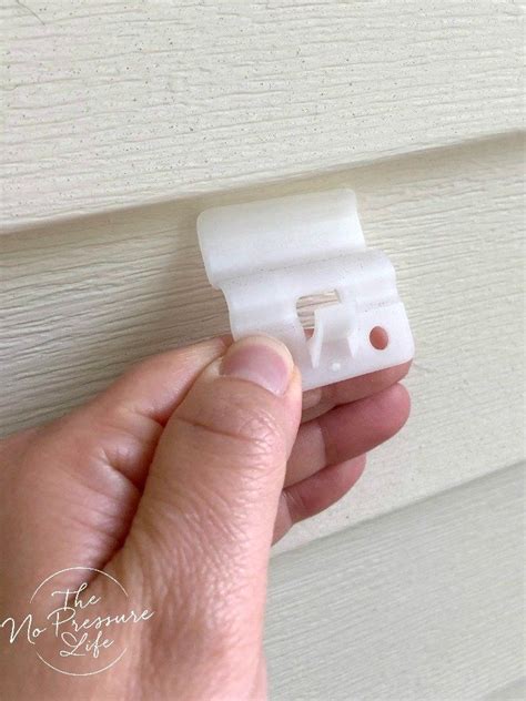 This is for people who want to decorate their rooms/apartment with art prints but cannot (or aren't allowed) to poke holes in the walls. How to Hang Things on Vinyl Siding Without Damaging Your Home | Vinyl siding, Vinyl siding hooks ...