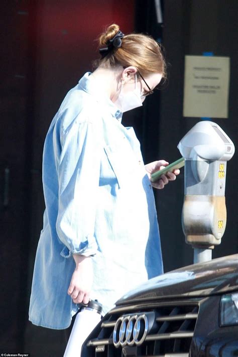 Keeping it casual in a pared back look, emma sported frayed cropped jeans teamed with a black top and checked jacket, accessorising her look with a beige across. Emma Stone - Running Errands in LA 02/05/2021 • CelebMafia