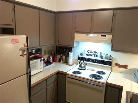 Wait 4 hours, then apply the second coat. foobella design: Painting Laminate Kitchen Cabinets. Done!