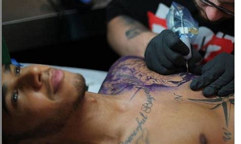 Apparently, the inspiration for the giant tattoo was attributed to the late rapper tupac. Lewis Hamilton gets inked in New York with massive new ...