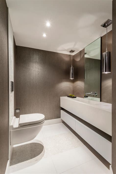 Powder rooms are as popular as ever because space is tight, but desire for style is unquenchable. Modern Powder Room in Taupe and White | HGTV