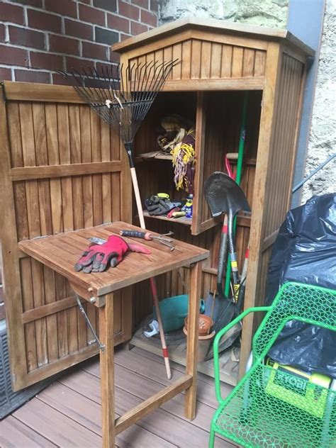 I have a vintage 1920s garage, with an original the tool cabinet of teak has lots of space for all the things one needs around the garden. Teak Garden Storage | Frontgate in 2020 | Garden storage ...