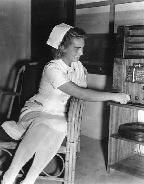 Devilsfilm college boys gangbangs teacher. Nurse listening to a radio during World War II | From a ...