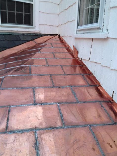 You copper roof will never catch on fire and will actually stop it from spreading further. Flat-seam Copper Roof, Brookline, MA - Colonial Craftsmen