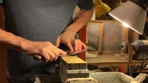 For a symmetrical edge, sharpen the knife by dragging it across the stone in the opposite direction you would move it to slice a thin layer off the stone. Professional knife sharpener shows you how to sharpen a ...