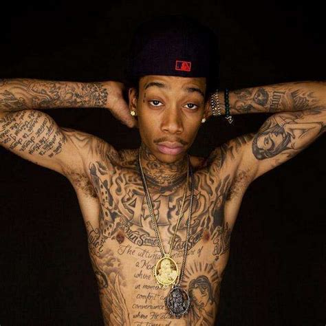 'tickets to my downfall' tattoo. Wiz Khalifa Tattoos: 5 Quick Facts