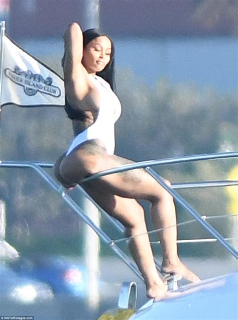 Those bikinis are the smallest i have ever seen. Blac Chyna shows off bodacious behind and cleavage in ...