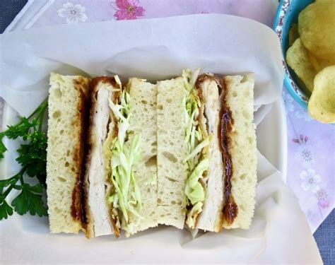 Crumbed grassy knoll eye fillet, lettuce, tomato, shallots, edamame, katsu mayonnaise, sesame. Katsu Sando | Recipe | Pork cutlets, Stuffed peppers ...