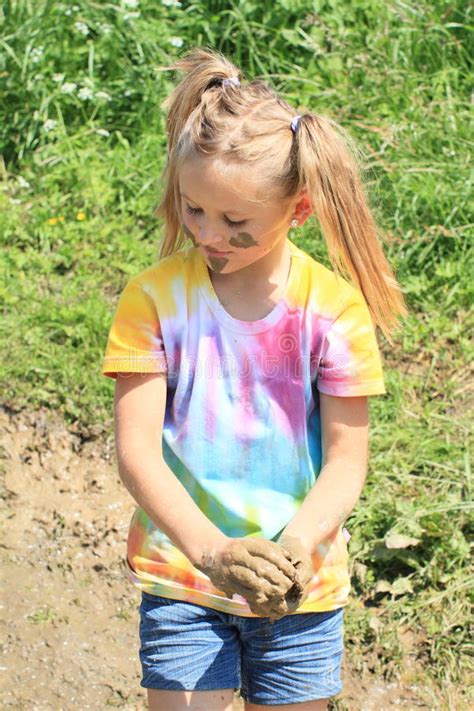 Created by whoami86a community for 8 years. Nasty girl holding mud stock image. Image of messy, colour ...