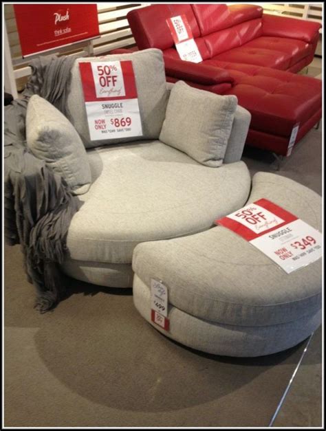 Consider a modern chair and a half to relax in style. Oversized Round Swivel Chair With Cup Holder | Living room ...