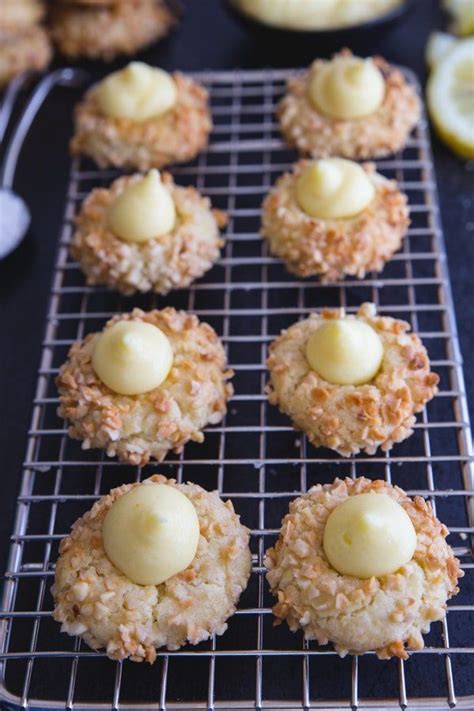 They can be used as a topping for thumbprint cookies or filling for linzer cookies. lemon thumbprint cookies filled with cream on a wire rack | Thumbprint cookies, Recipes, Easy ...