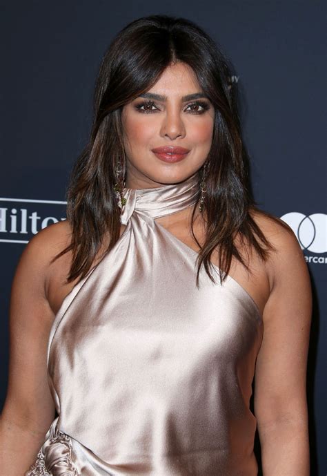 She might have her reasons for doing it but as a normal person the only possible reasons i can think of are : Priyanka Chopra 2020 Pre-Grammy Gala 1 | Satiny