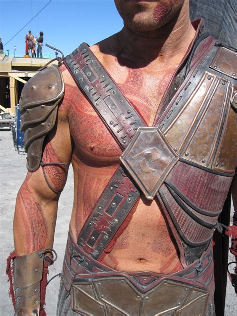 Collins' right upper arm has some patterns over which there is a writing that says, 'andersen afb'. John Carter red man | John carter of mars, Lynn collins ...