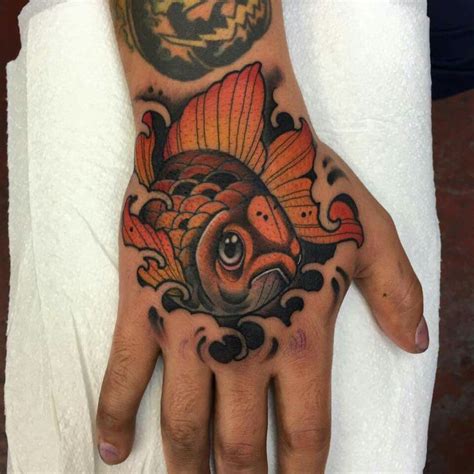 Affordable and search from millions of royalty free images, photos and vectors. Mitch Allenden Goldfish tattoo | Hand tattoos, Goldfish tattoo, Japanese hand tattoos