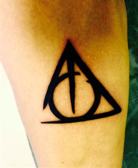 My name is harry wilson, i'm a student studying digital advertising and desing Harry Potter Deathly Hallows Tattoo