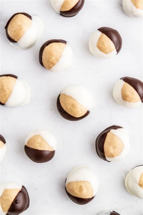 You haven't had a truffle, until you have these chubby hubby buckeye peanut butter truffles. Double Chocolate Buckeyes Recipe | Girl Versus Dough
