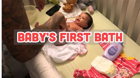 If you have a tub at home you will probably want a small bath sling or something that can go in the kitchen sink for many baby bathtubs fit in sinks, but not all baby bathtubs are shaped like flowers. Baby's First Bath | Bath Time with Daddy - YouTube