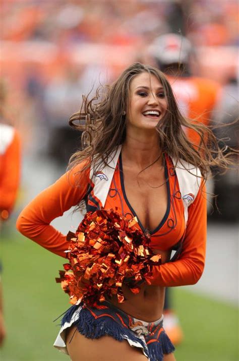 A member of the denver broncos cheerleaders performs during a break in the action against the washington redskins at. DBC Nikki | Denver bronco cheerleaders, Broncos ...