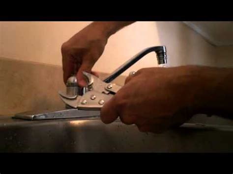 I would start off trying to identify the brand and the model of the faucet then doing a google and/or youtube search. Changing O-ring on Kitchen Faucet 1 - YouTube