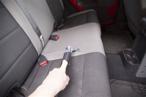 Apply the upholstery cleaner to the entire seat surface. How to Steam Clean Car Seats | It Still Runs