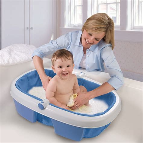 It comes complete with a mirror, a robot razor and a spaceship toy. Summer Infant Newborn-to-Toddler Portable Folding Bath Tub ...