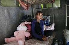 ukraine fleeing ukrainian refugee civilians dozens