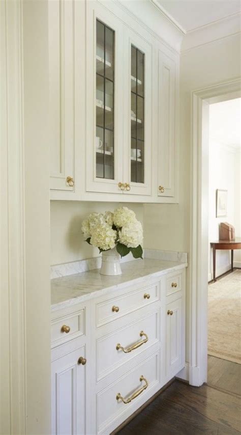 Wall mullion door cabinet with 2 doors 2 shelves in white. Stately & Subdued: A Classic White Kitchen | Glass pantry door, Beautiful dining rooms, Classic ...