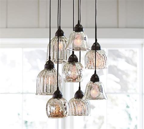 Whether above a dining table or in the kitchen, see your space in an elegant new light with the timeless spherical silhouette of our glass globe pendant. Kenzie Mercury Chandelier | Pottery Barn # ...