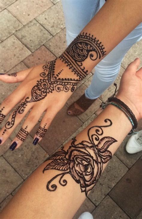 Including feathers, maple leaves, necklaces, bracelets, flowers, butterfly and so on. rose henna tattoo | Rose henna, Henna tattoo, Henna