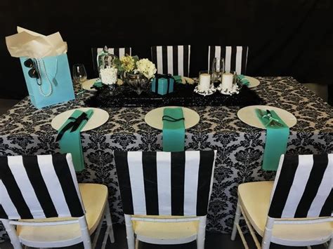 Asks your gets to wear black elegant outfits with rhinestone embellishments. Pin by The Tablecloth Hiring Company on Breakfast at Tiffany's | Home decor, Table decorations ...