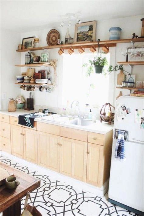 The form comes from 19th european taste with sprinklings of eastern and north african decor. a vintage meets boho kitchen with light-colored cabinets, open shelving, artworks and a mosaic ...