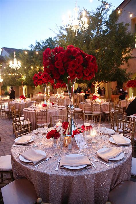 Minimalist floral clusters, delicate vases, candles and table runners can all serve as impactful centerpieces. Red Rose Filled Wedding Day | Strictly Weddings | Wedding ...