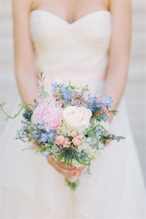 At this outdoor wedding, the couple covered the gift table with a purple tablecloth that matched the flowers in the bridal bouquet. Light Blue and Pink May Wedding, Light Blue Bridesmaid ...