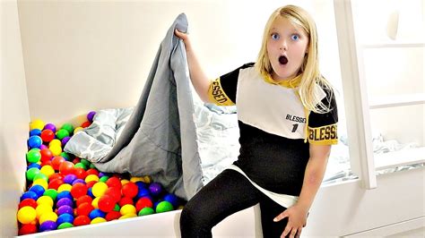 I Filled My SISTER'S Bed with BALL PIT BALLS PRANK! - YouTube