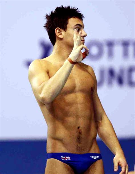 Great britain's tom daley knits in the stands during the women's 3m springboard final at the tokyo aquatics centre on the ninth day of the tokyo 2020 olympic games in japan. Tom Daley - Diving Superstar: TOM DALEY - LATEST IMAGES