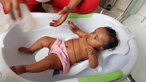 To do so, lay baby down in the bath and gently splash some water onto her head. HOW TO BATHE YOUR BABY IN WINTERS #KIWIINDIANVLOGS - YouTube