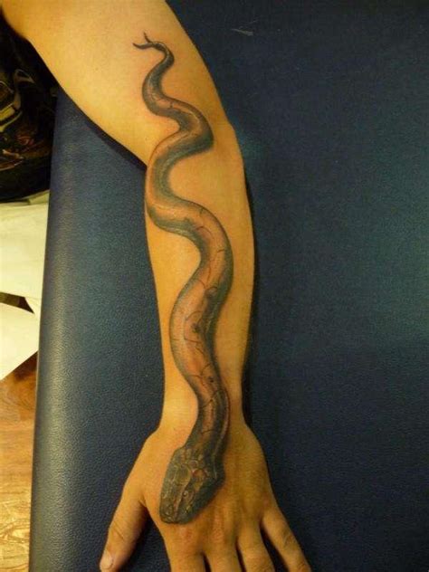 Taylor dees did this great little snake tattoo on her client heather recently. 25 Cool Snake Tattoos - Desiznworld