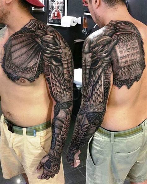 This tattoo represents a sign of faith, and an owl is a symbol of truth. 36 Stunning Armour Tattoos On Chest