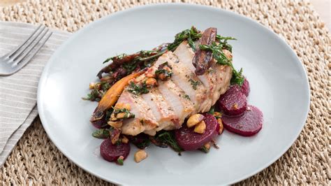 Reviewed by millions of home cooks. Center-Cut Pork Chops with Beet, Carrot & Hazelnut Salad - TODAY.com